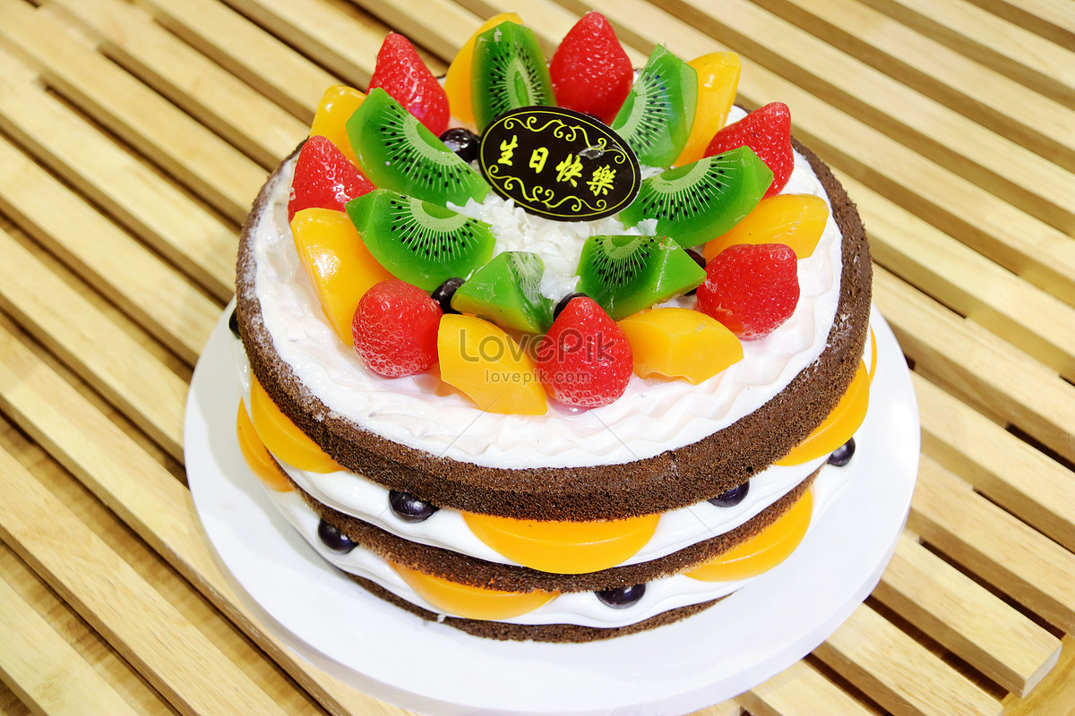 Eggless exotic fruit cake for a little boy who loves fruits and hot wheels  | Instagram