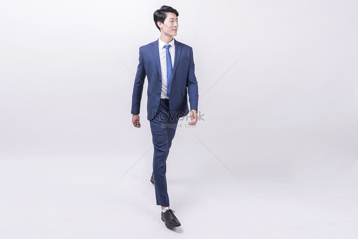 Young Guy Walking Along Street Poses Stock Photo 659028829 | Shutterstock