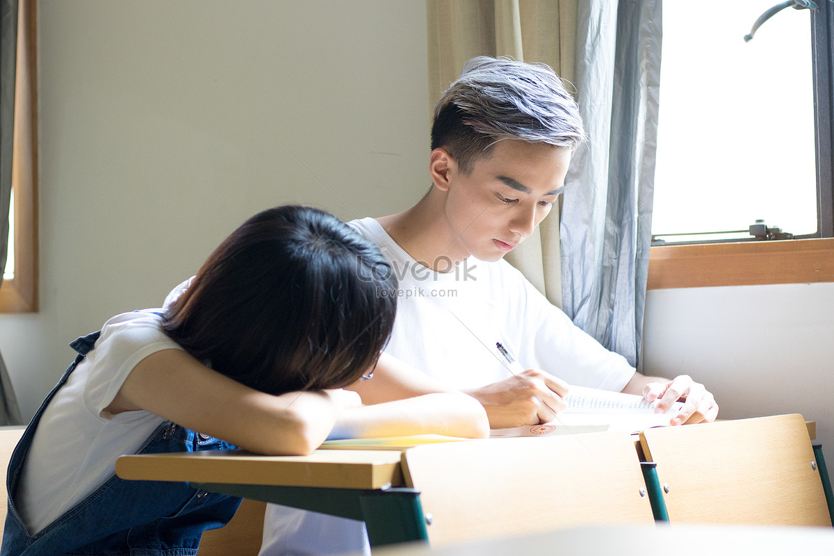 Who did the homework. Do homework carefully. Pupil who is doing homework. Picture he did homework carefully. The boy does his homework carefully.