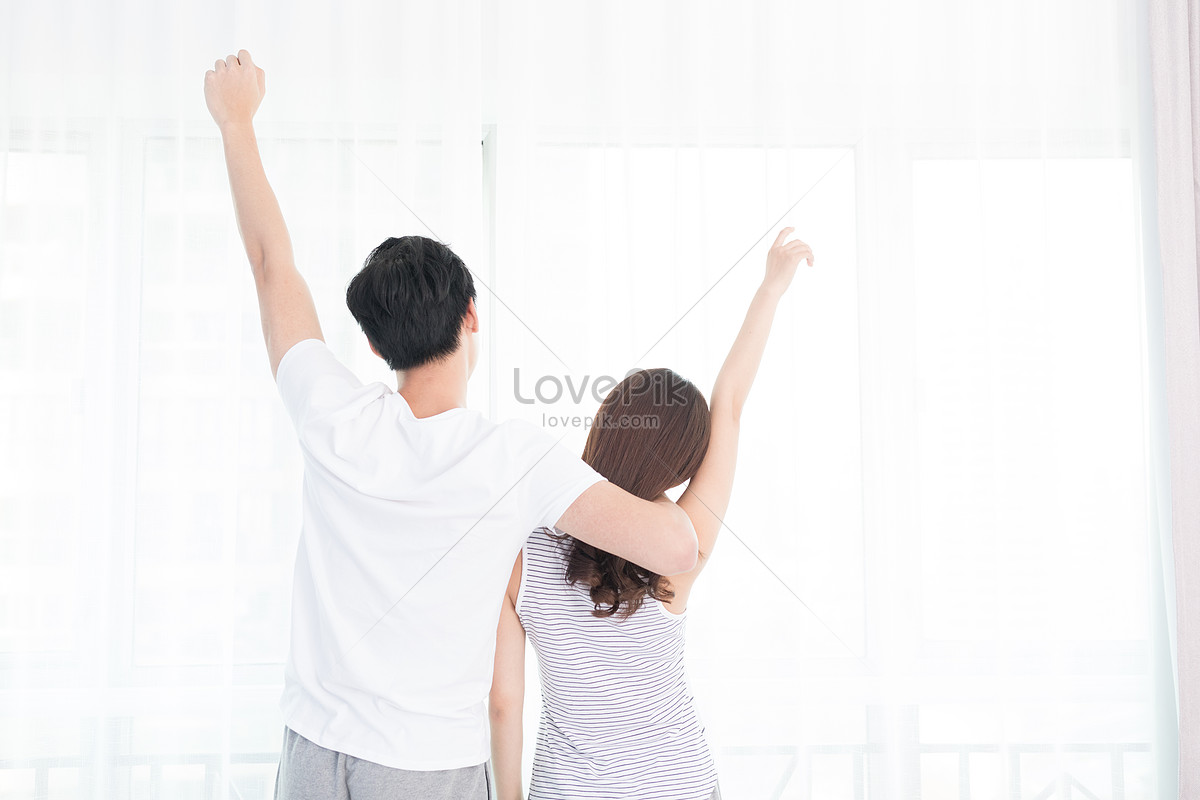 Couple standing in Front of each other Low Angle.