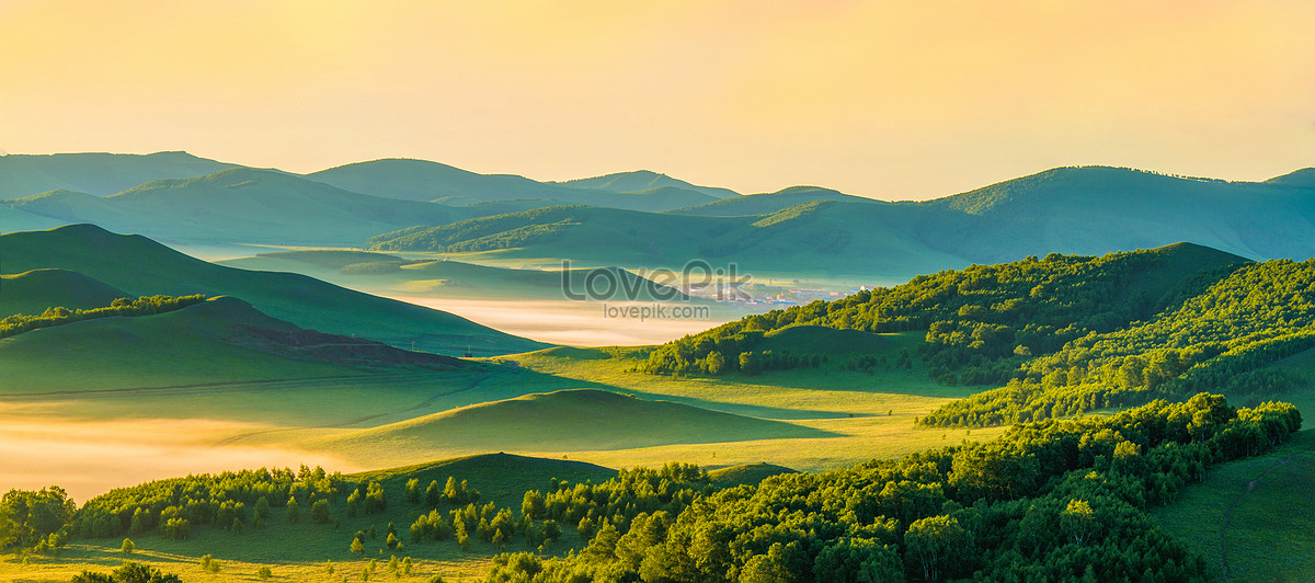 Download Rising Sun In Mountainous Valley Wallpaper