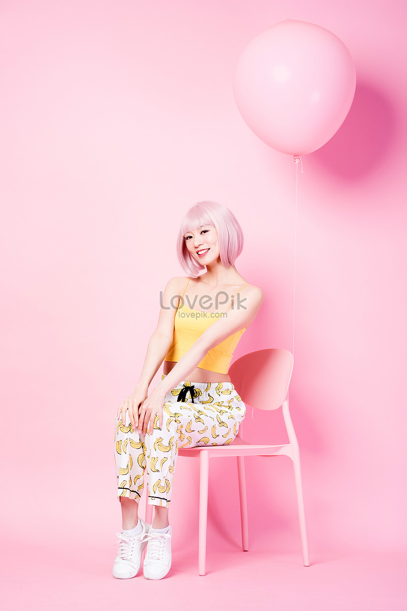 A Nifty Fashion Female Model Sitting On A Pink Chair Picture And Hd Photos Free Download On 2470