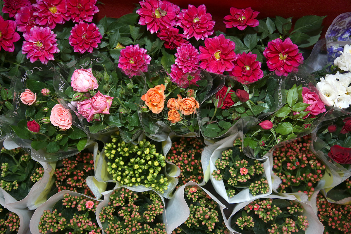 Bouquets Roses for Sale at Florist`s Shop on Street Flower Market