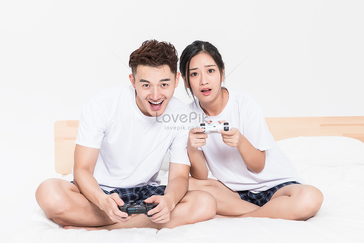 Couple Playing Video Game - Stock Photo - Masterfile - Premium