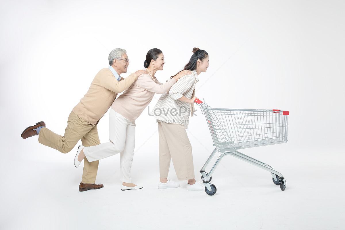 Daughter&apos;s parents shopping cart shopping, supermarket shopping, famil...