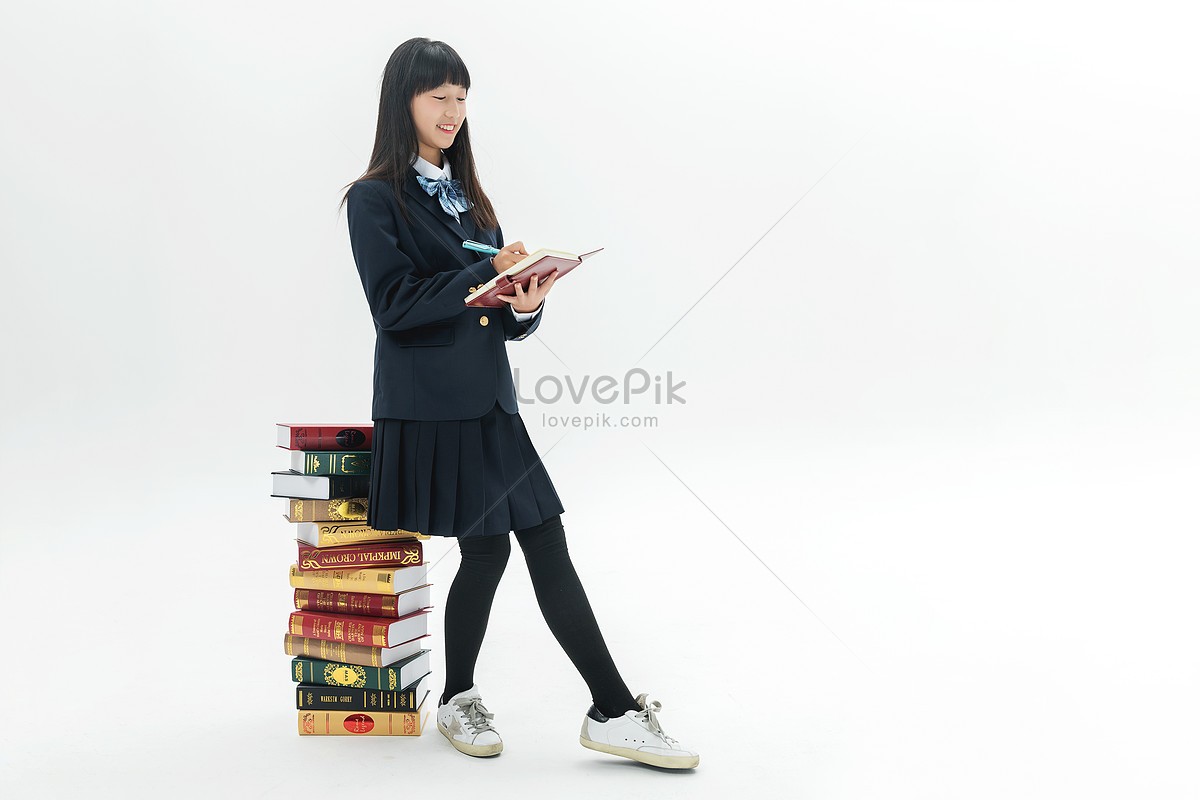 Female students write their homework by books, and homework, book, asian female HD Photo
