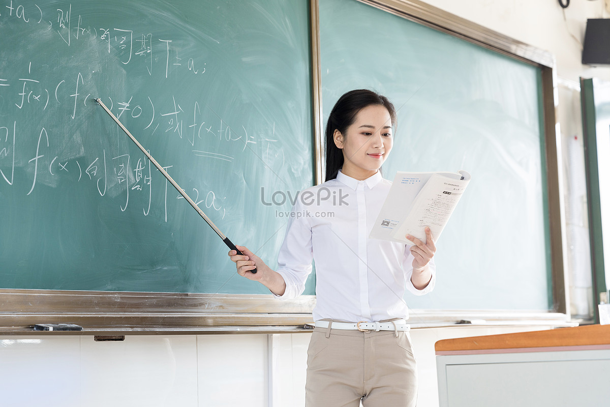 Учительница с указкой фото. Учительница с указкой и книгой силуэт. Tablo teacher pic. Teacher teaching stock pic.