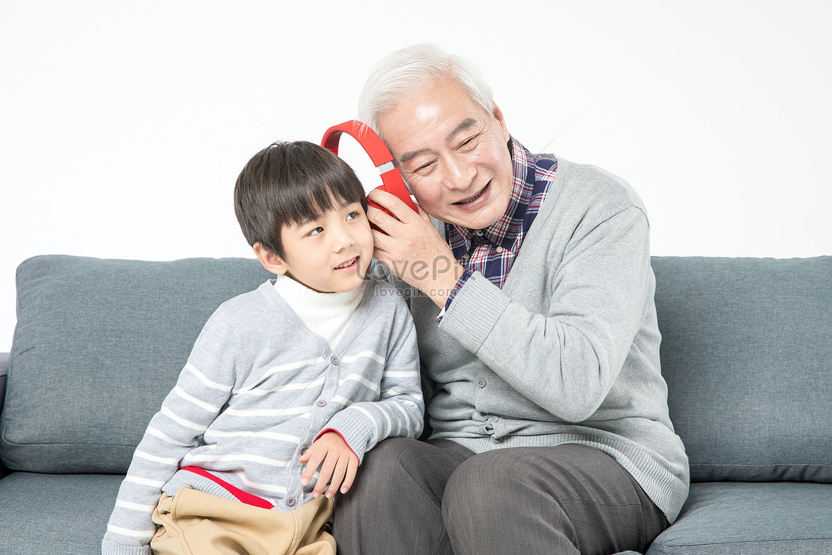 Grandfather And Grandson Listen To Songs On The Sofa Picture And Hd