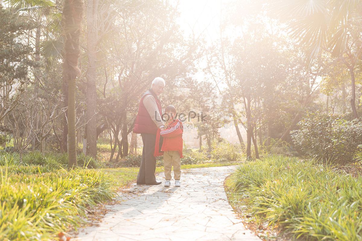 Grandpa Took His Grandson For A Walk In The Sunset Picture And HD ...