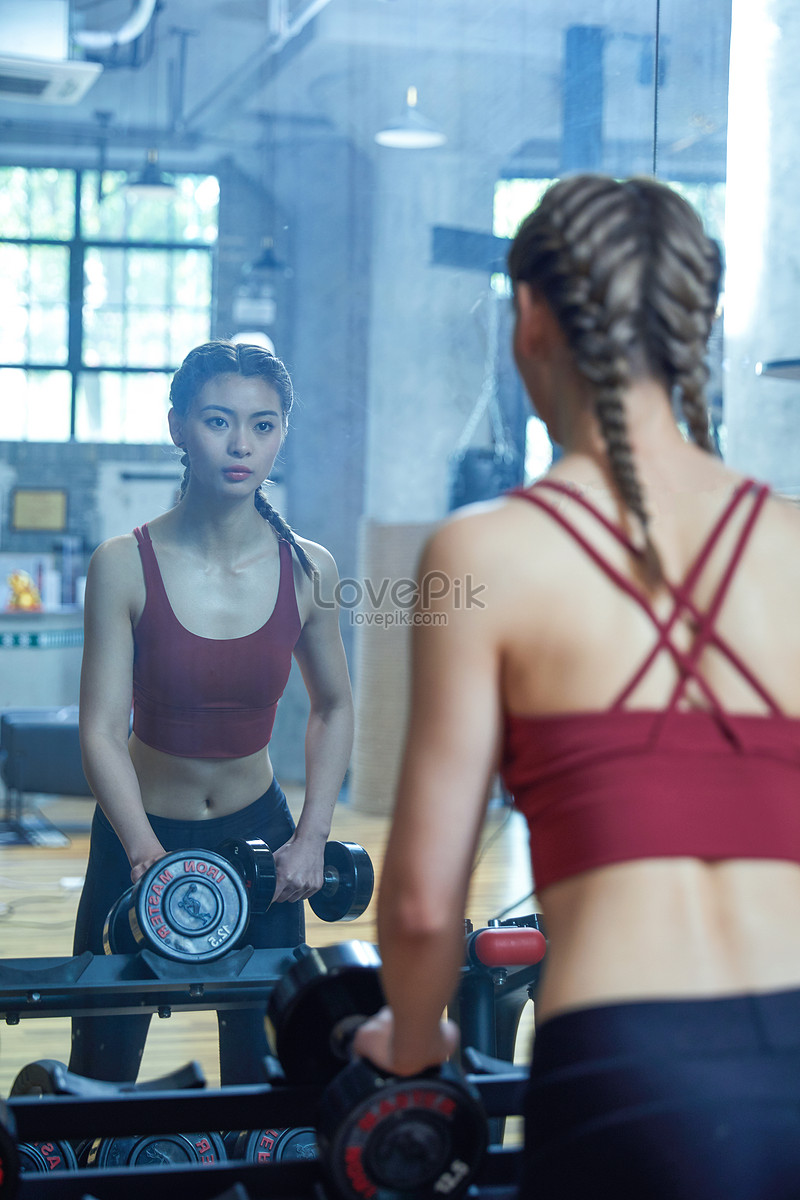 Young Pretty Girl Work Out In The Gym Stock Photo - Download Image