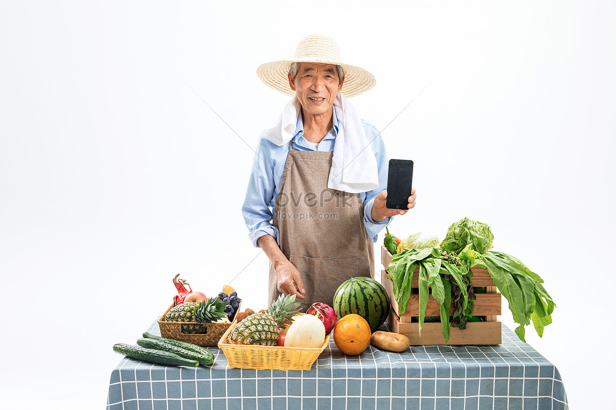 Fruit Farmer Holding Mobile Phone Picture And HD Photos | Free Download On  Lovepik