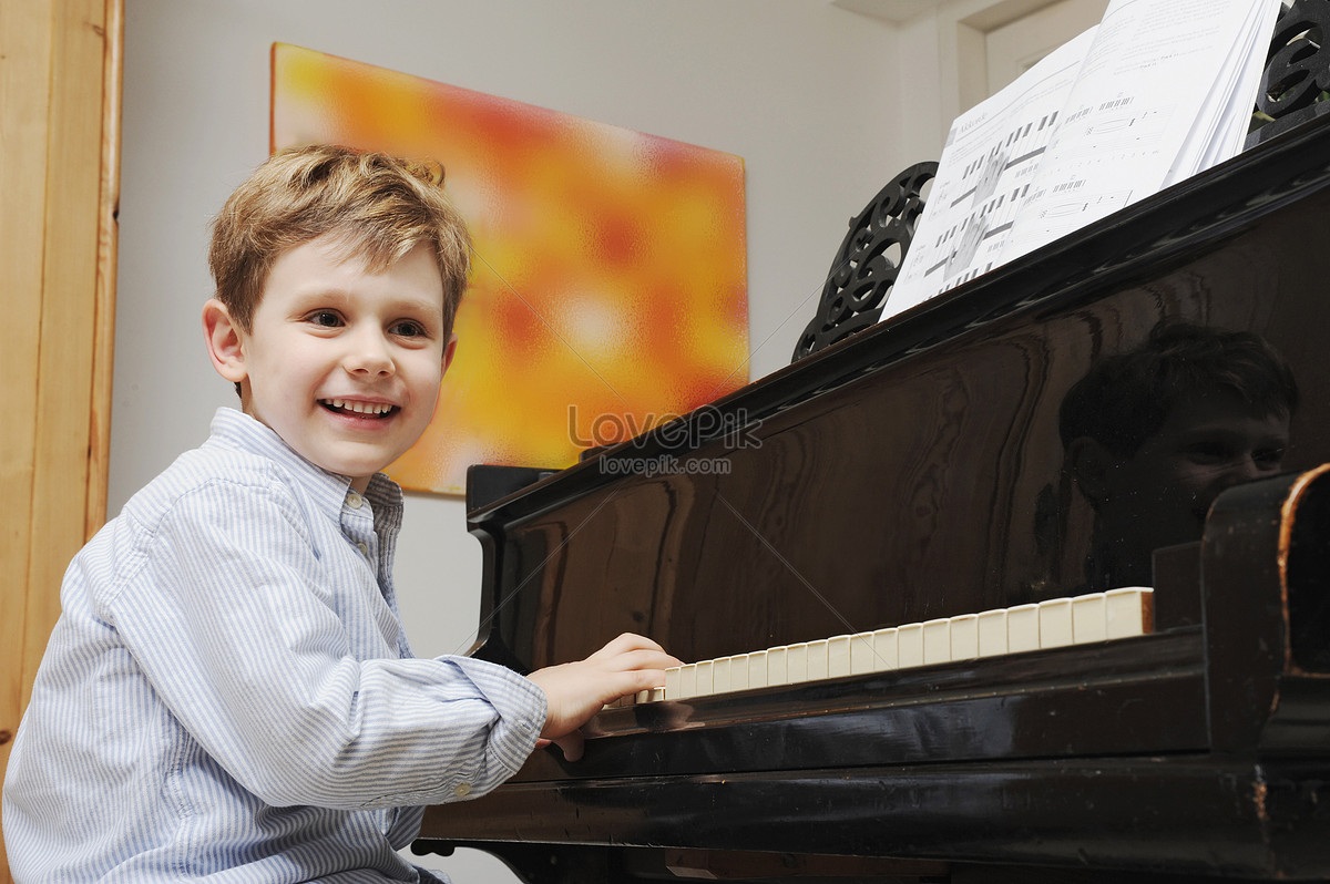 Boy Playing Piano In The Living Room Picture And HD Photos Free   Lovepik Boy Playing Piano In The Living Room Picture 501443332 