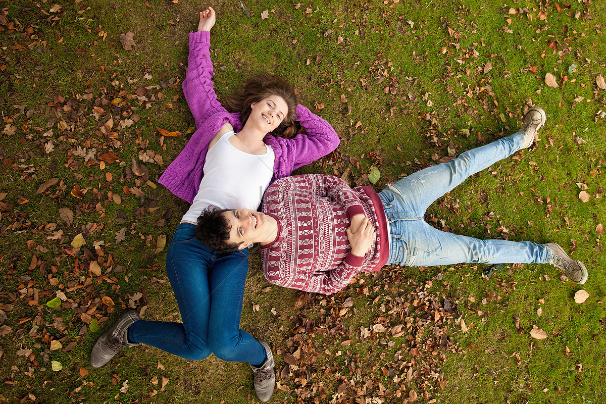 Couple Lying On The Grass In The Park Picture And Hd Photos Free Download On Lovepik