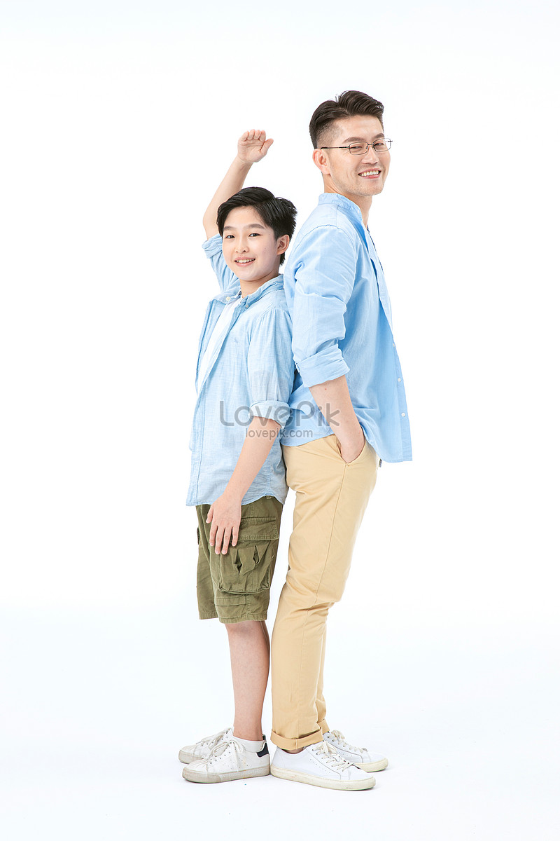 Father And Son Compare Height Stock Photo - Download Image Now