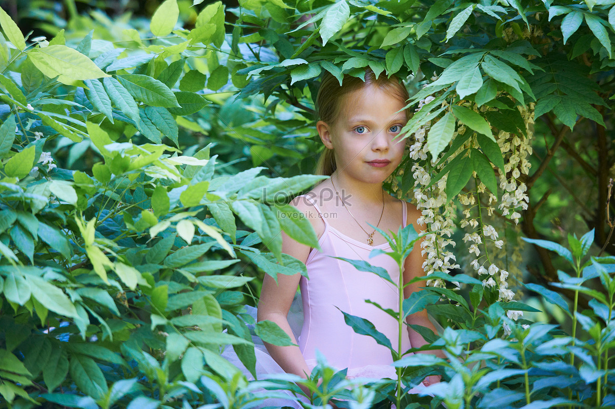 The girl in the bushes