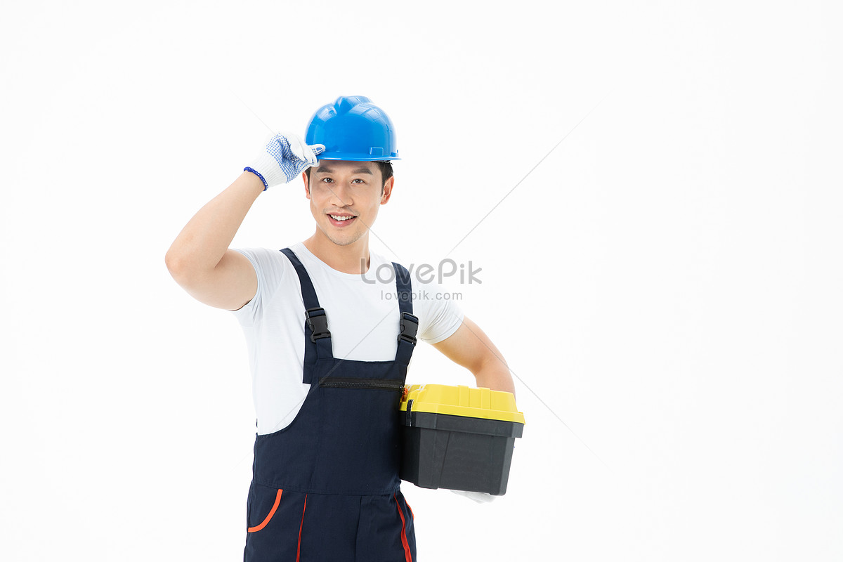 Worker holding a BX. Electrician worker.