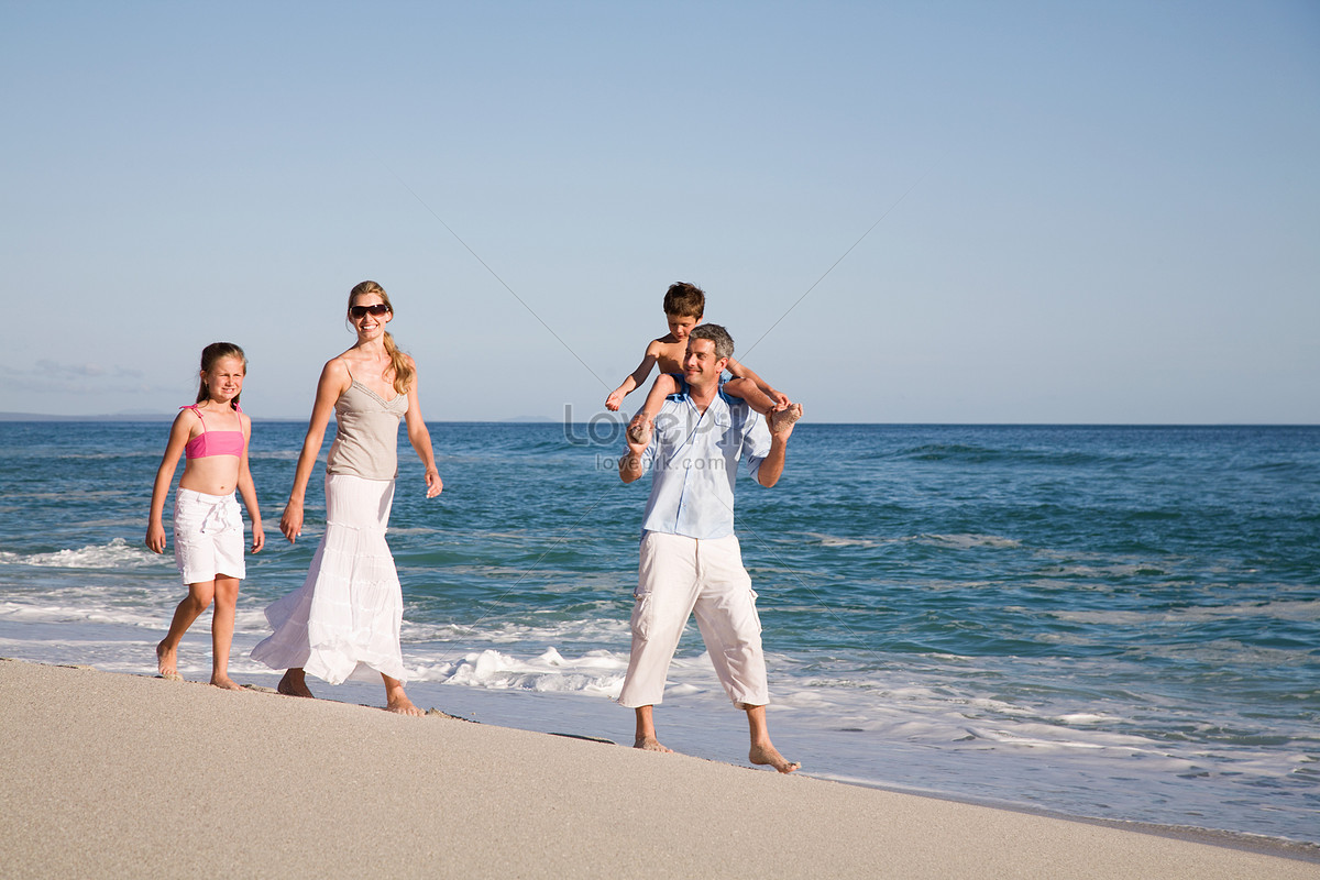 family beach walk