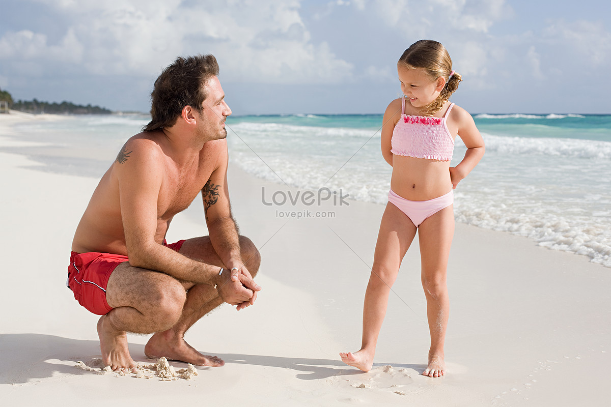 Father And Daughter On The Beach Picture.