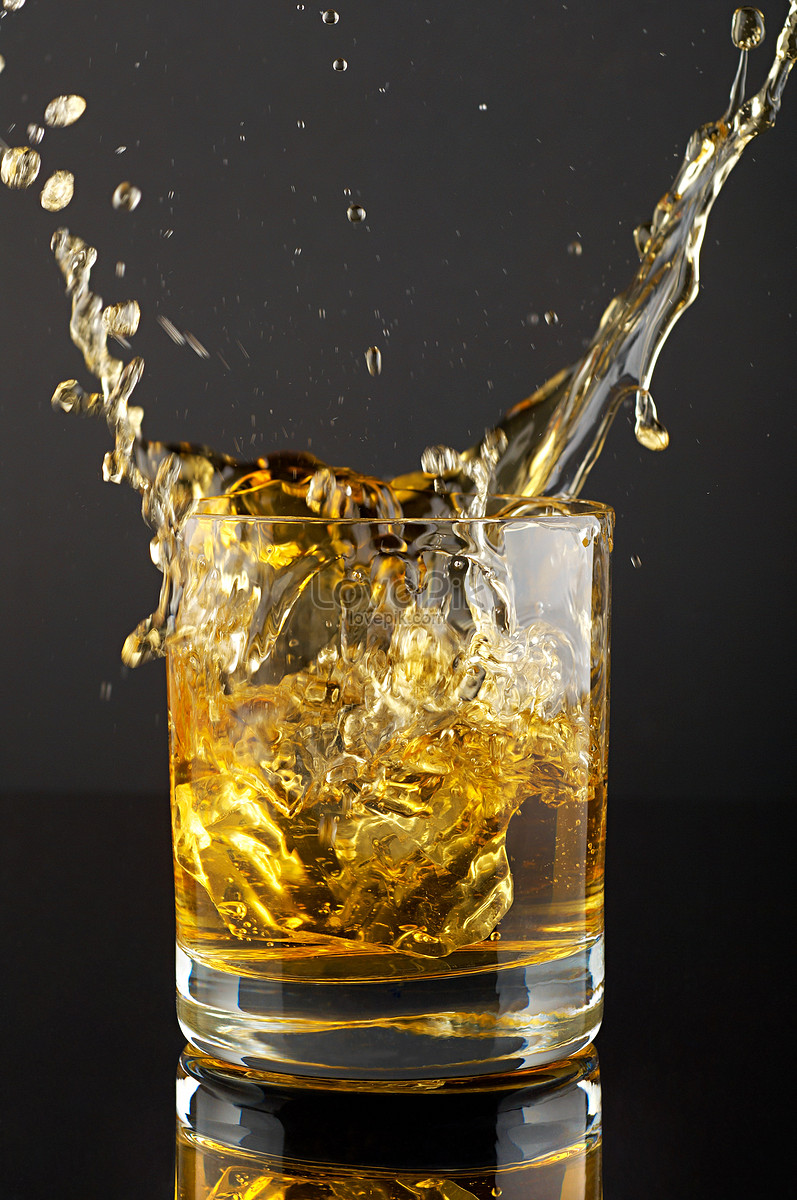 Ice Cubes Splashing In A Large Glass Of Whiskey Picture And HD Photos |  Free Download On Lovepik
