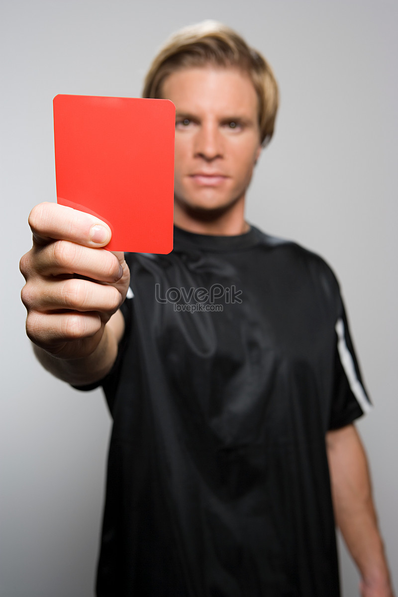 Referee whistling holding red card Royalty Free Vector Image