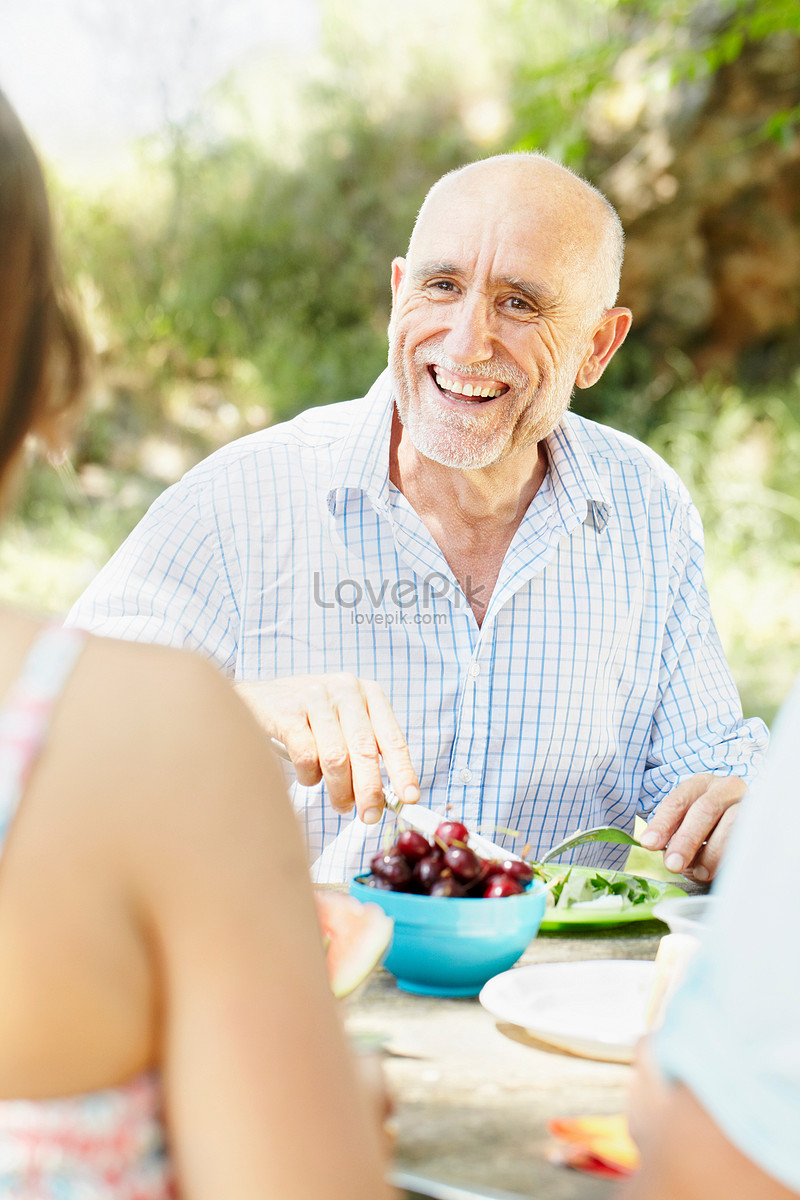 Senior Man Smiling At Picnic Table Picture And Hd Photos Free