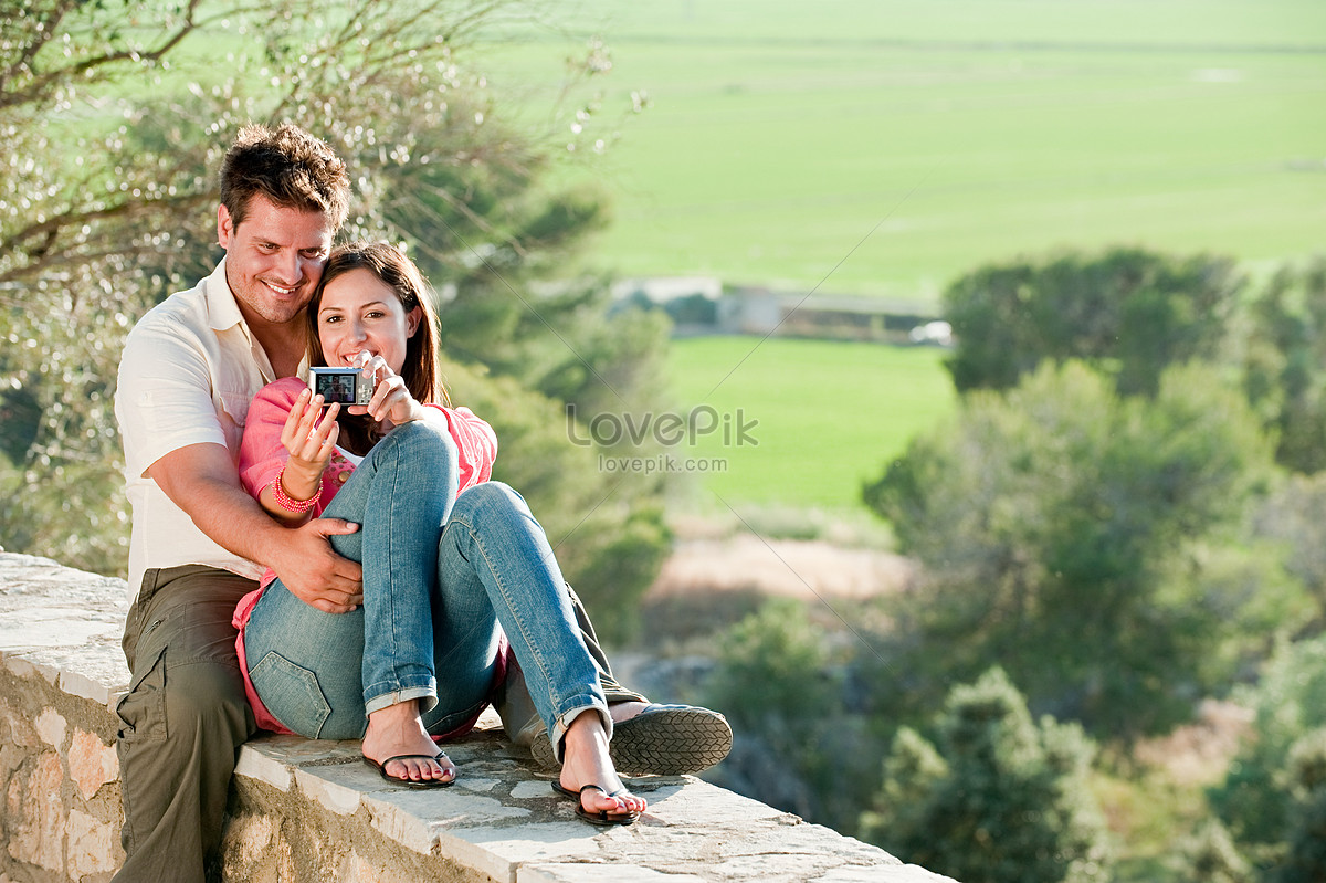 Couple Pose For A Rooftop Selfie