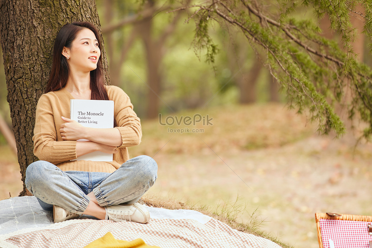 Young Female Reading A Book Under The Tree Picture And HD Photos | Free ...