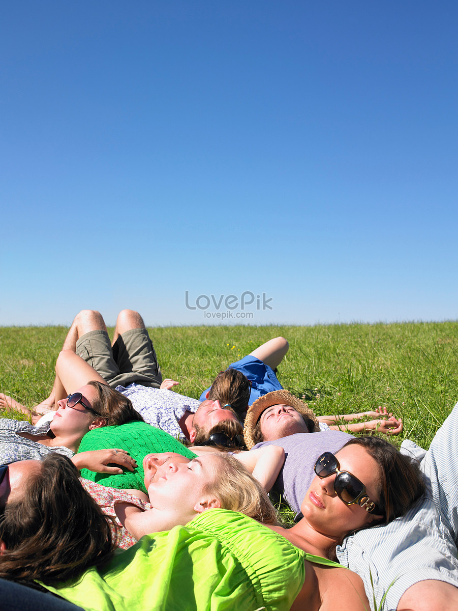 Group Of Young People Lying On The Ground And Resting Picture And HD ...