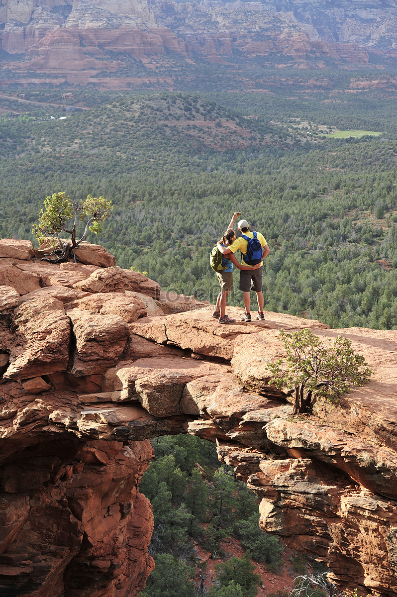 Hiking Couple From Arched Rock Group In Sedona Arizona Usa Picture And ...