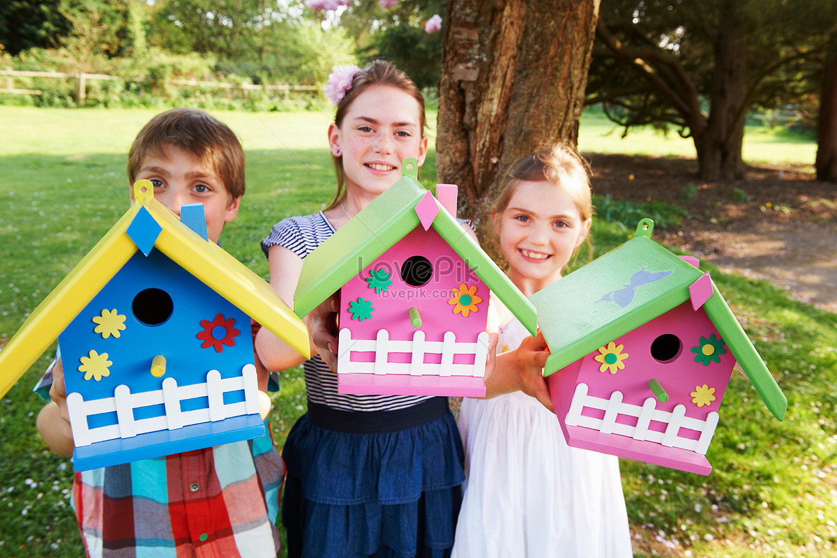 Kids Hugging Bird House In Backyard Picture And HD Photos | Free ...