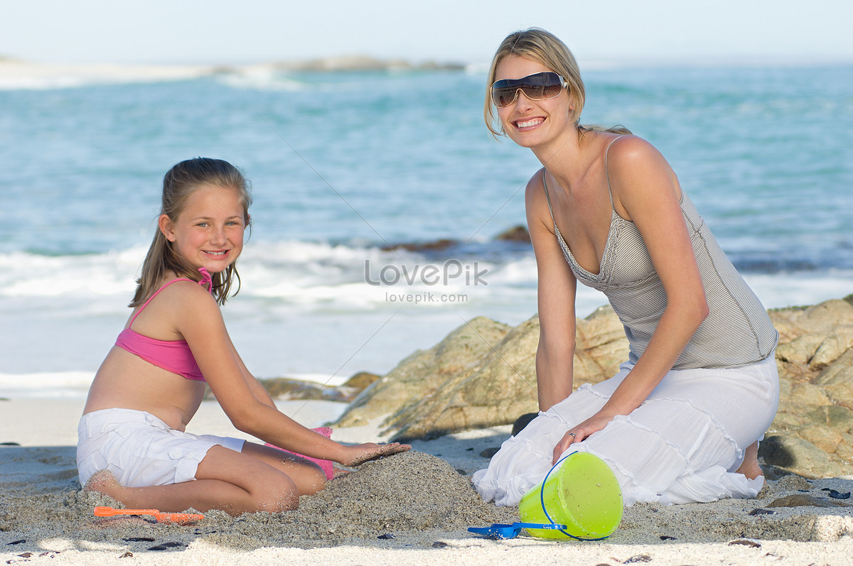 black and white striped two piece bathing suits with aqua bows Mother daughter o