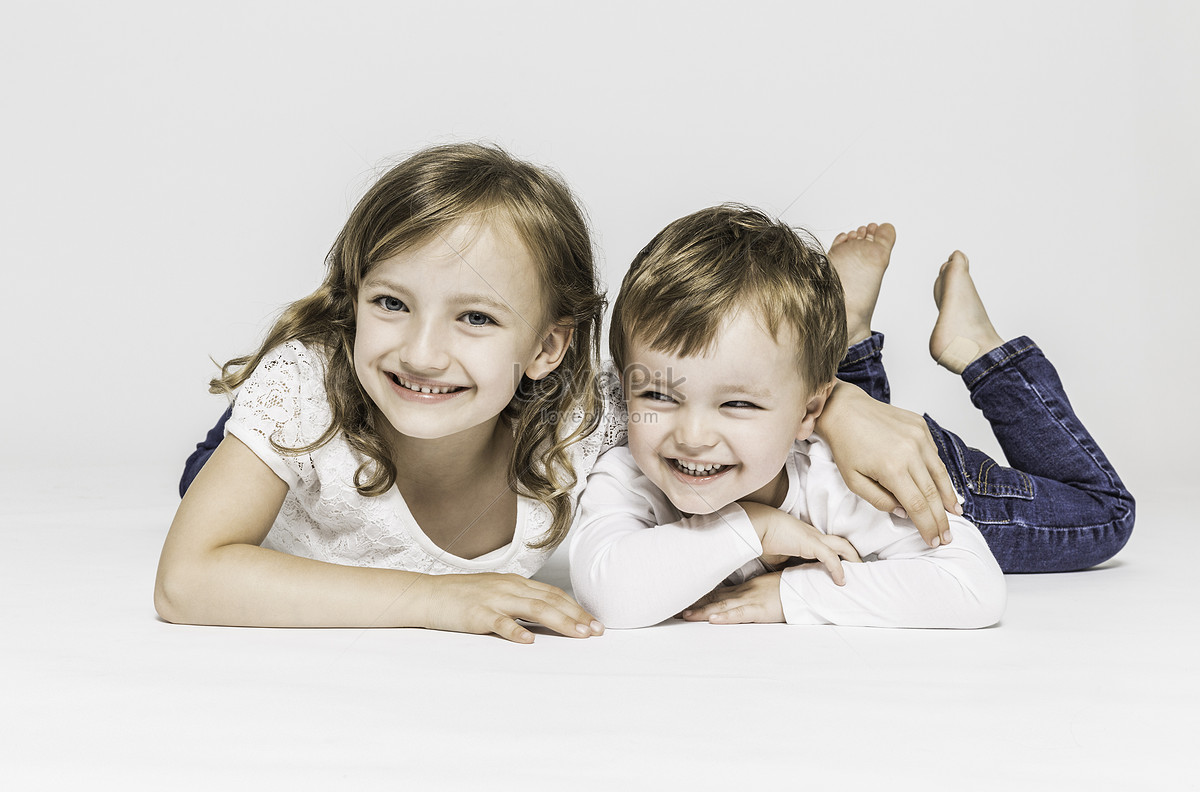 Siblings Lying On The Ground Picture And Hd Photos Free Download On