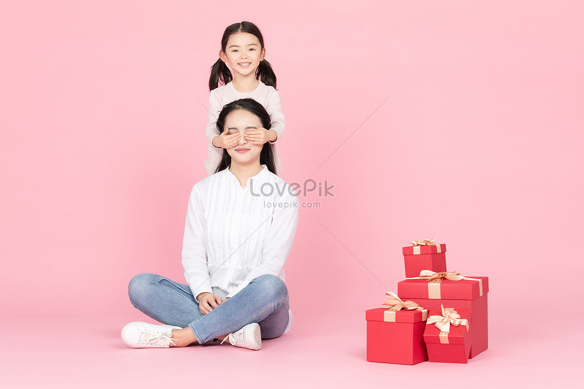 Asian Mom Delivers Red Gift Box Stock Photo 1236607957