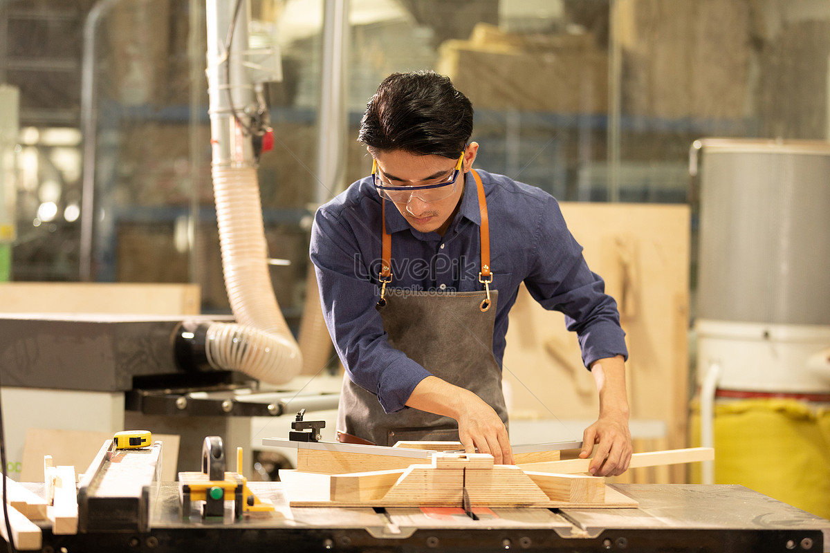 Carpenter Worker Cutting Wood Material Picture And HD Photos