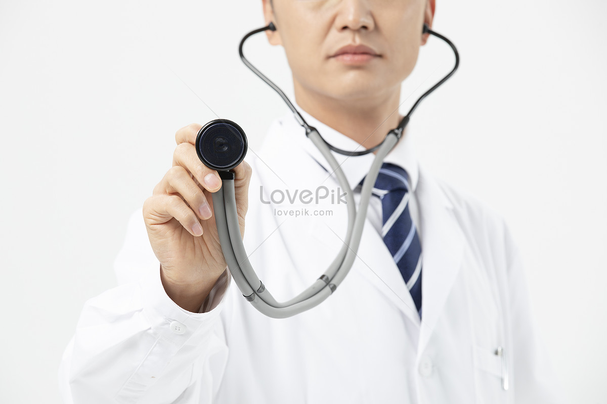 Happy Male Doctor Holding Sign Stock Photo Download Image Now Holding, One  Person, People IStock | Portrait Of A Male Doctor Holding A Stethoscope  Poster 