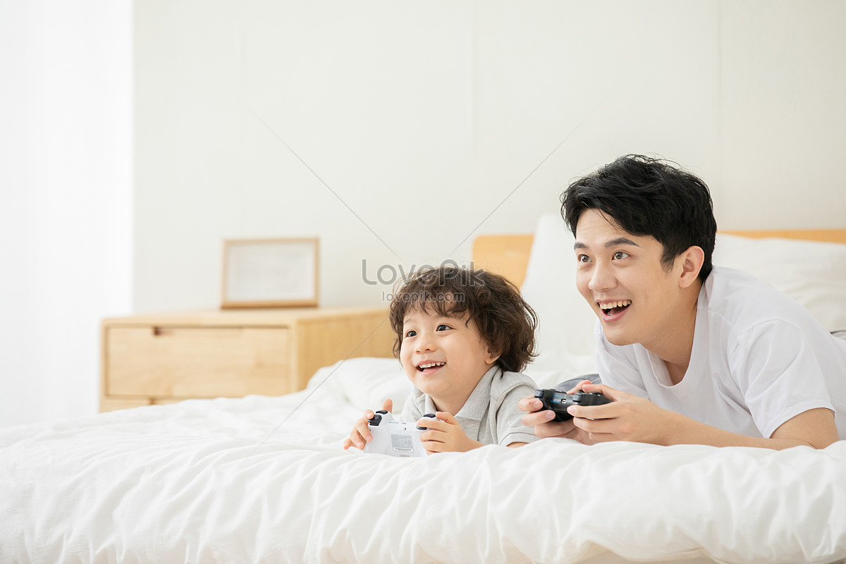 Father And Son Playing Video Games At Home Picture And HD Photos | Free  Download On Lovepik