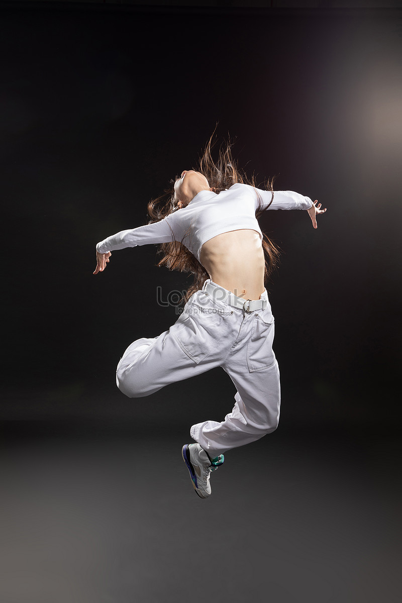 Beautiful Woman Dancer In Hip Hop Attire Striking A Pose Stock Photo,  Picture and Royalty Free Image. Image 14165877.