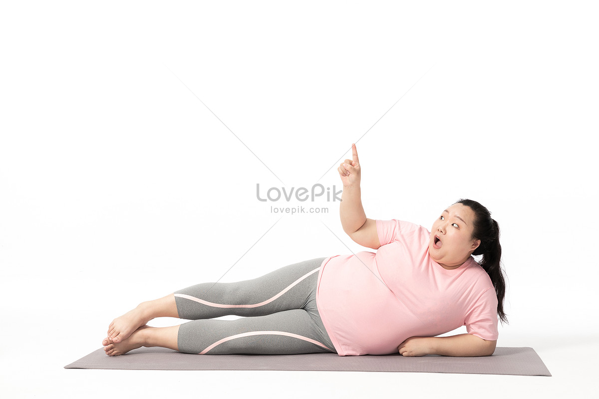 Beautiful Fat Woman Doing Yoga on the Mat Stock Photo - Image of
