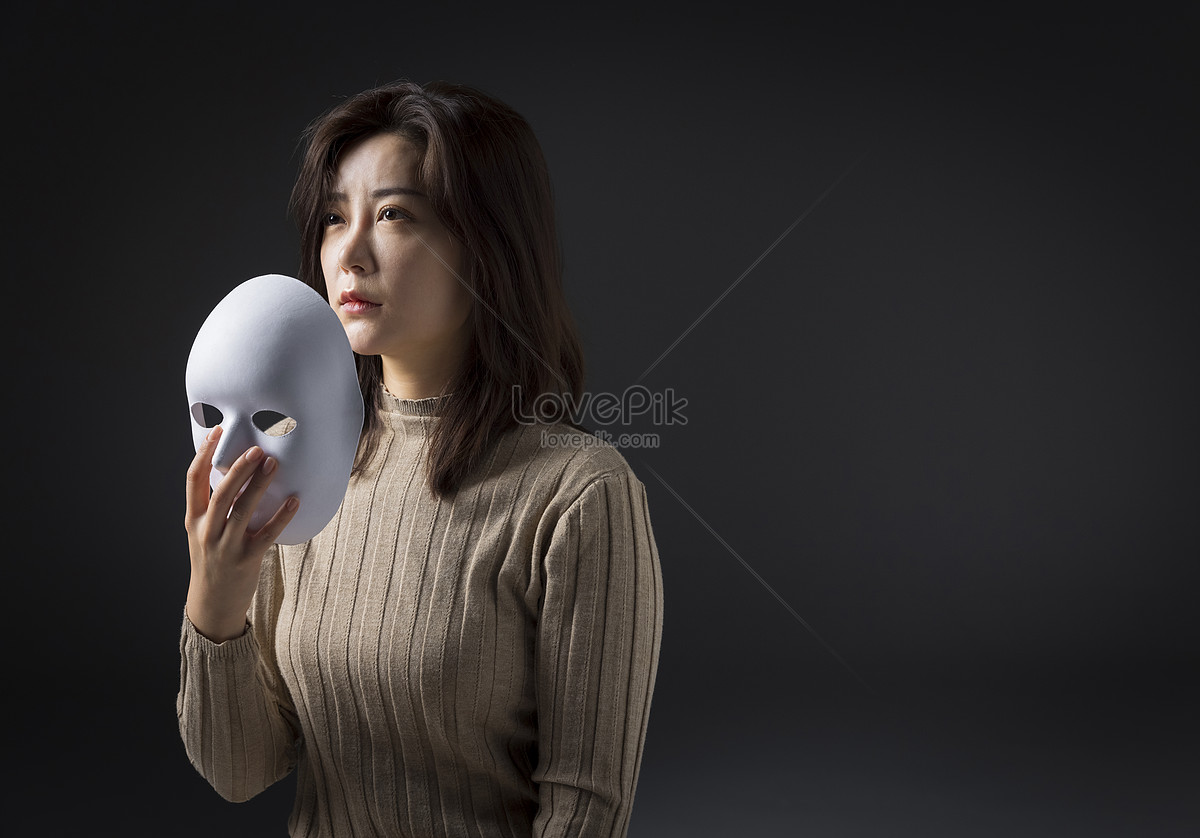 New Zealand Citron læber A Woman Who Takes Off Her Mask To The Light In The Dark Picture And HD  Photos | Free Download On Lovepik