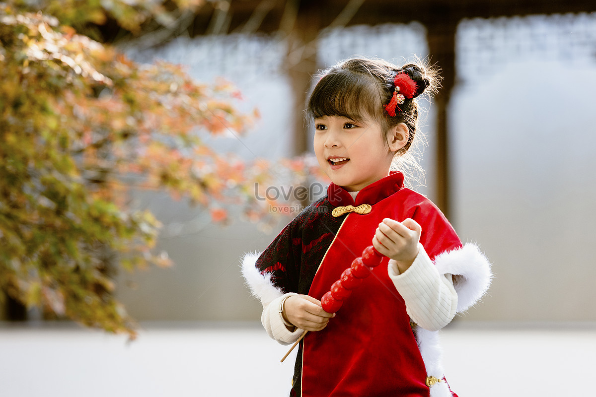 Chinese Style Children Strolling In The Park With Candied Haws During ...