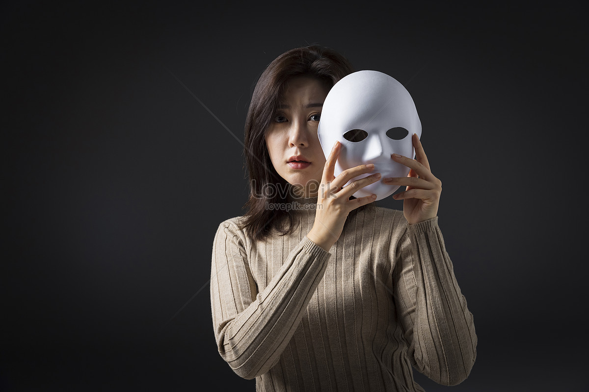 Women Take Off The Mask And Look Sad Picture And HD Photos Free 