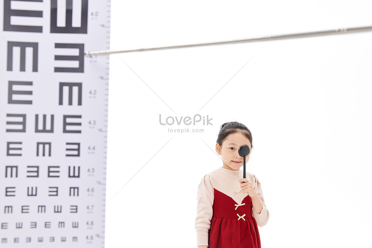 Cute voyage little girl testing vision, password, mobile device, eyes HD Photo