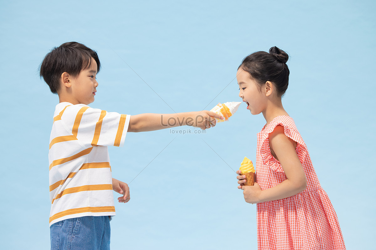 Girl deals feeding boy