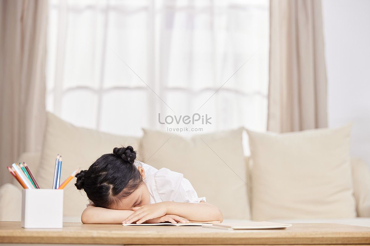 little-girl-is-doing-homework-at-home-and-falls-asleep-picture-and-hd