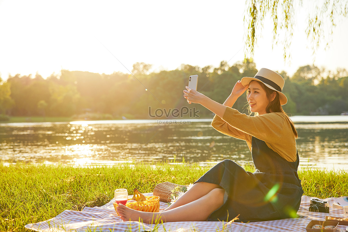 Mobile Phone Selfie Of Picnic In Beauty Park At Dusk And Sunset Picture