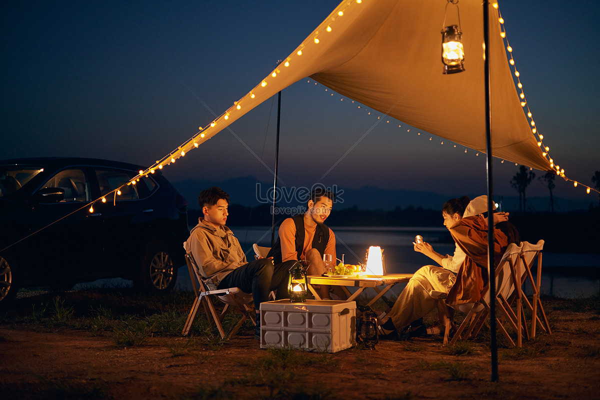 Young Friends Have An Outdoor Camping Party At Night Picture And HD ...