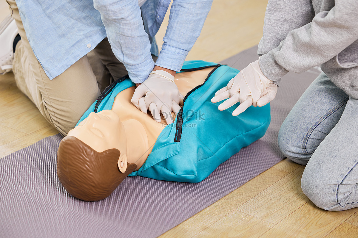 Close Up Of Male Teacher Demonstrating Cpr First Aid Gesture Picture ...