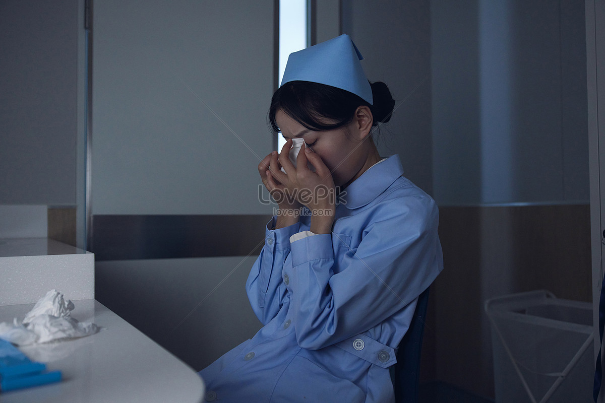 Nurse Crying With Sad Expression In Restroom Picture And HD Photos ...