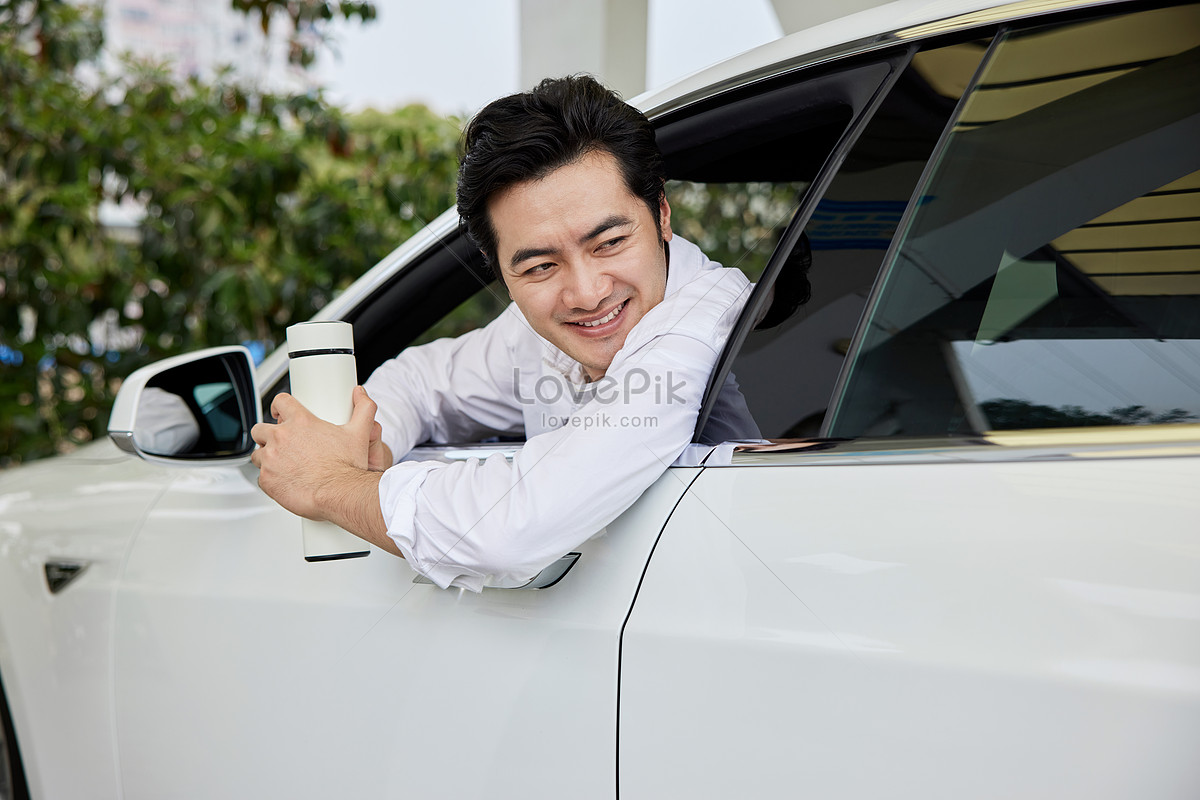 Leaning out of car