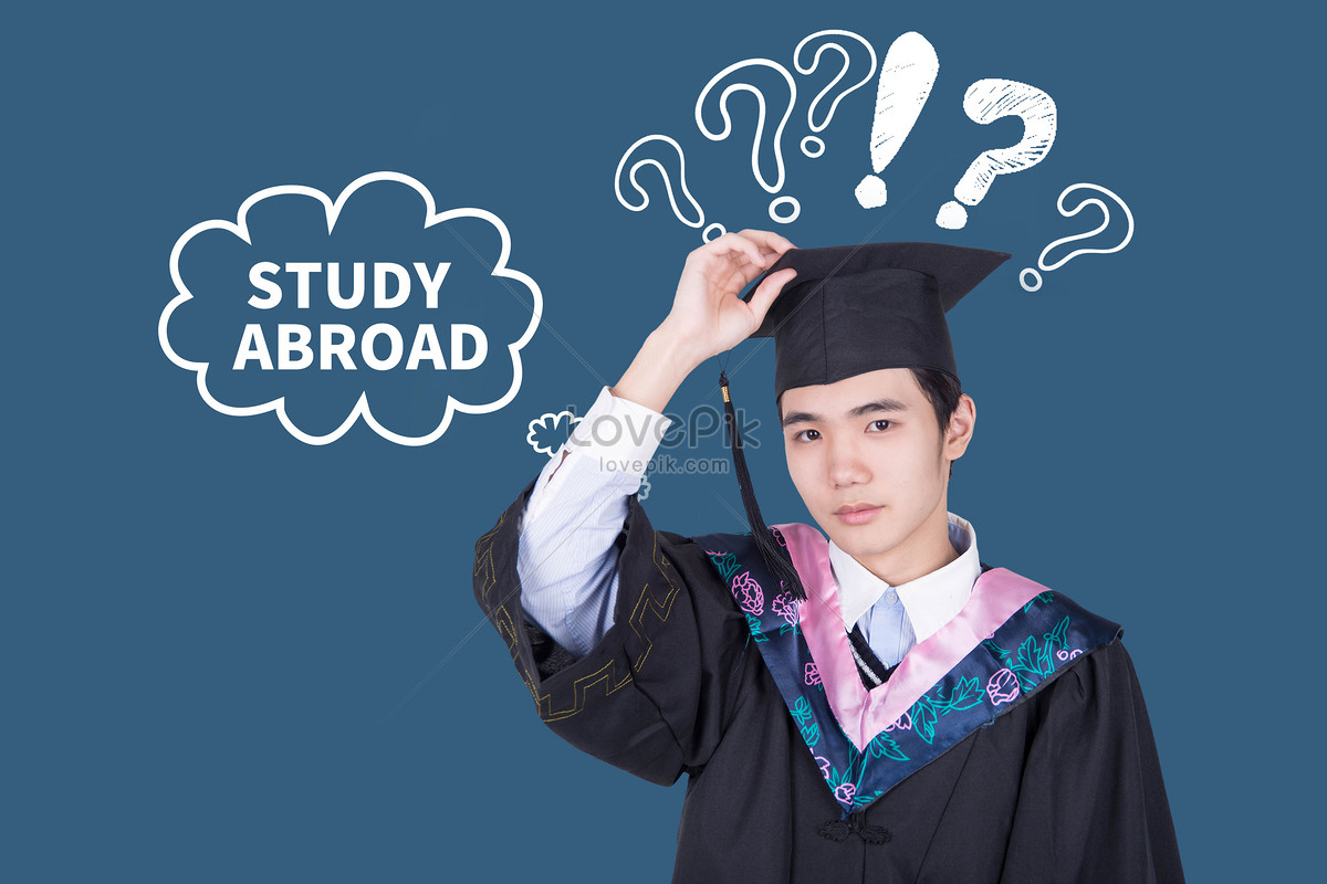 Graduate study abroad concept : Graduation cap on calendar paper